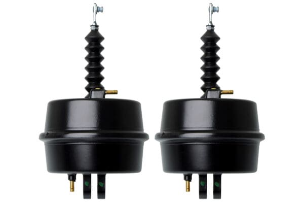 A pair of black brake booster assemblies with two springs.