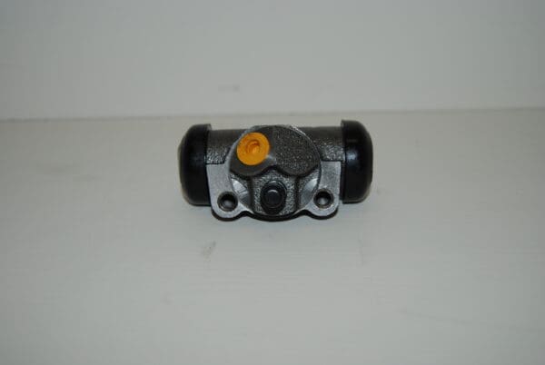 A close up of the front wheel brake cylinder