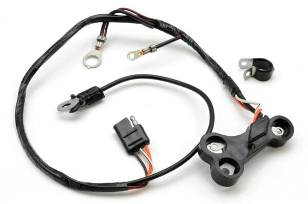 A wire harness with an electrical plug and wires.