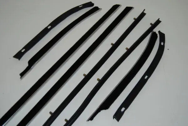 A set of eight pieces of black plastic.