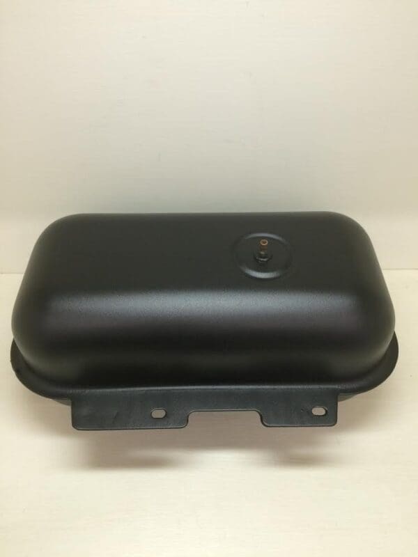 A black plastic container sitting on top of a table.