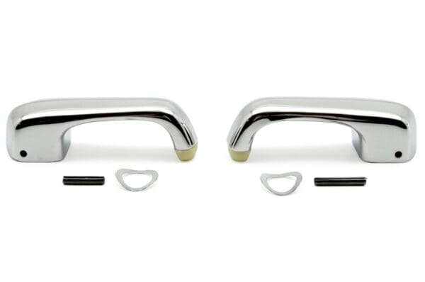 A pair of chrome handles with a white background