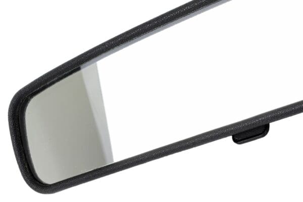 A rear view mirror with the reflection of a car in it.