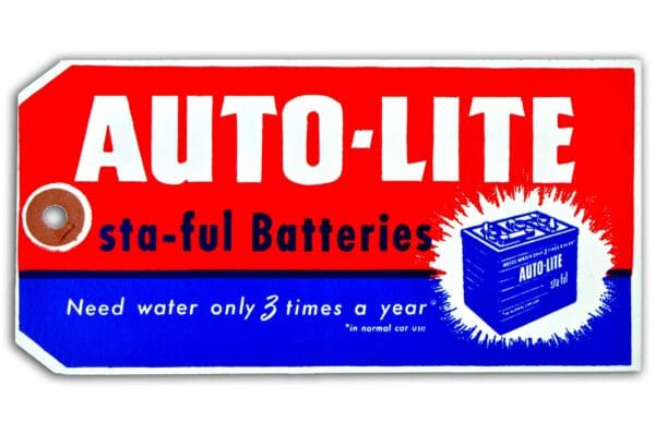 A sign advertising auto-lite batteries.