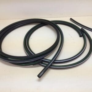 A pair of black plastic tubing sitting on top of a table.