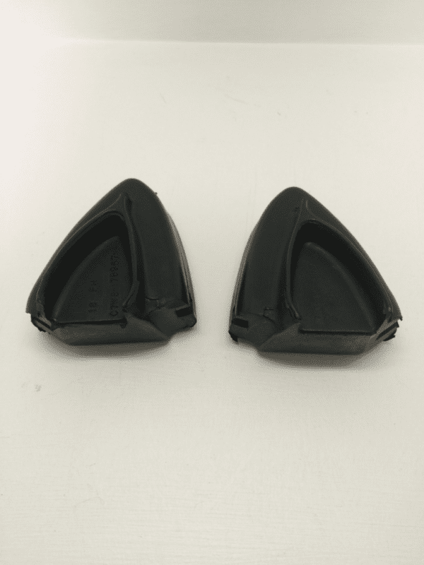 A pair of black triangle shaped earrings.