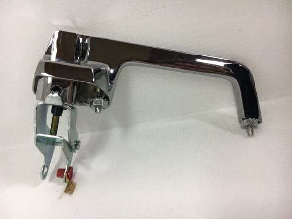 A chrome faucet with a metal handle and spigot.