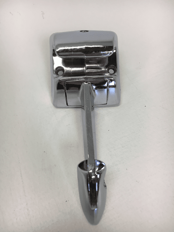 A close up of the handle on a bathroom faucet.