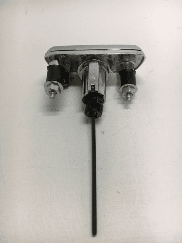 A black and white photo of an old fashioned faucet.