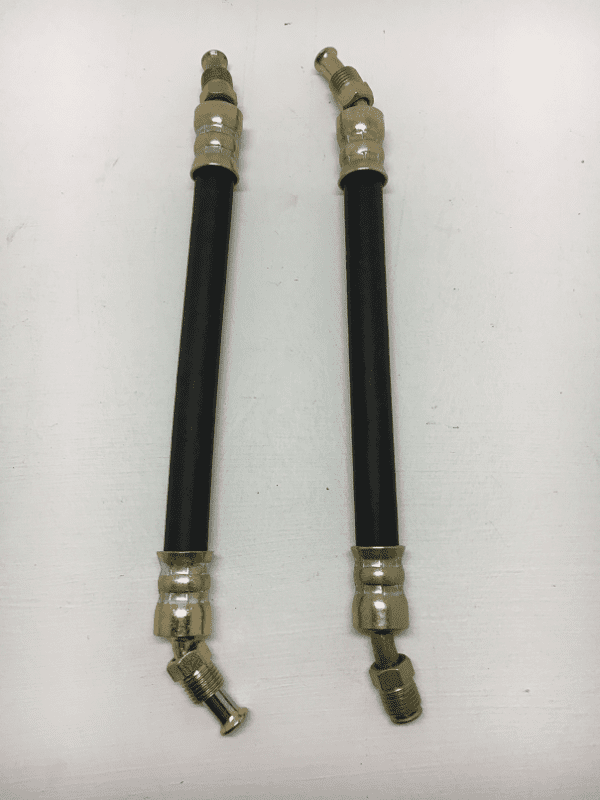 A pair of black and silver cords with a metal clasp.