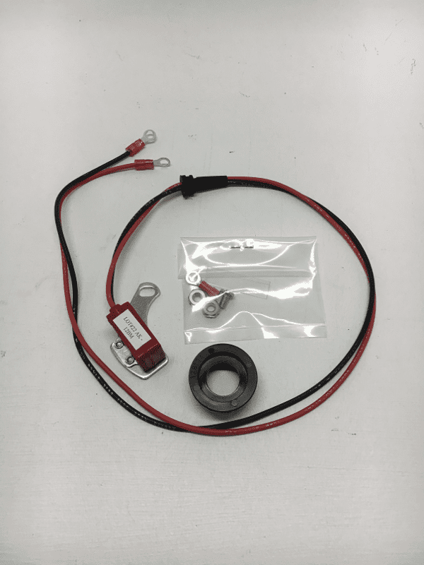 A red and black wire with an electrical device on it