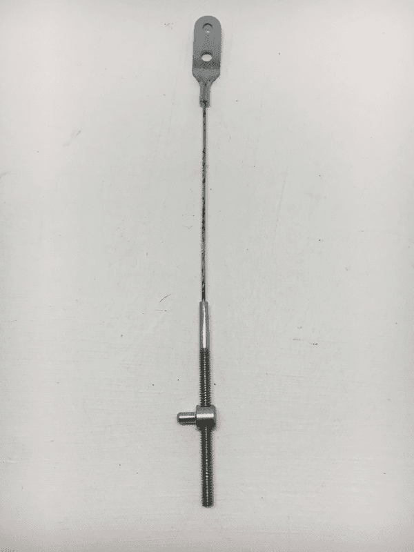 A black and white photo of a metal pole.