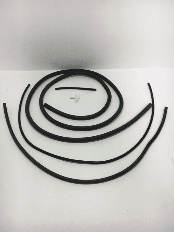 A black wire is curled up on top of the table.