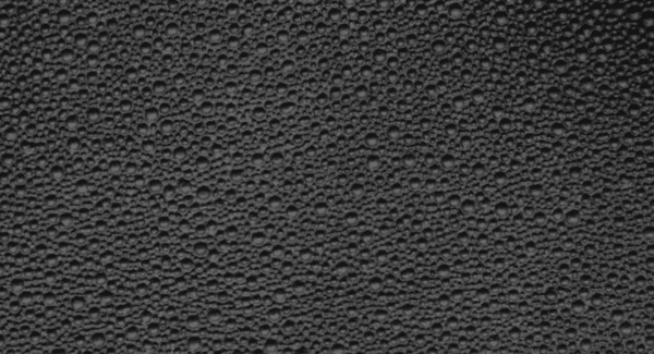 A black background with many small bubbles.