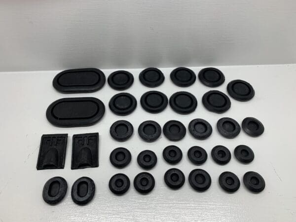 A table with many different types of rubber parts.