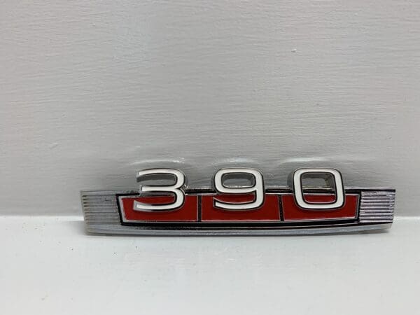 A close up of the number 3 9 0 on the hood