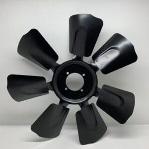 A black fan blade is shown on the wall.
